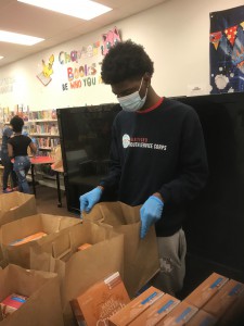 OPP member bagging food at Barbour April 8