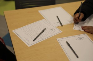 Customers at the Park Street Library at the Lyric were invited to write letters to be included in a time capsule.