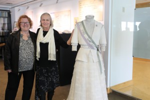 Lisa Curren of the Roberts Foundation, left, and artist Marilyn Parkinson Thrall stand next to "The Art of Perseverance."