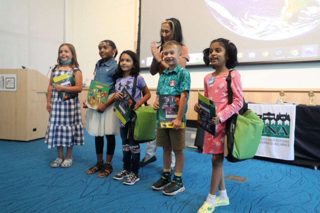 The winners of the 2022 REACH Book Author Contest at the Park Street Library @ the Lyric on Thursday, August 18th, with Leticia Colon de Mejias, founder and CEO of Energy Efficiencies Solutions and the keynote speaker for the event.